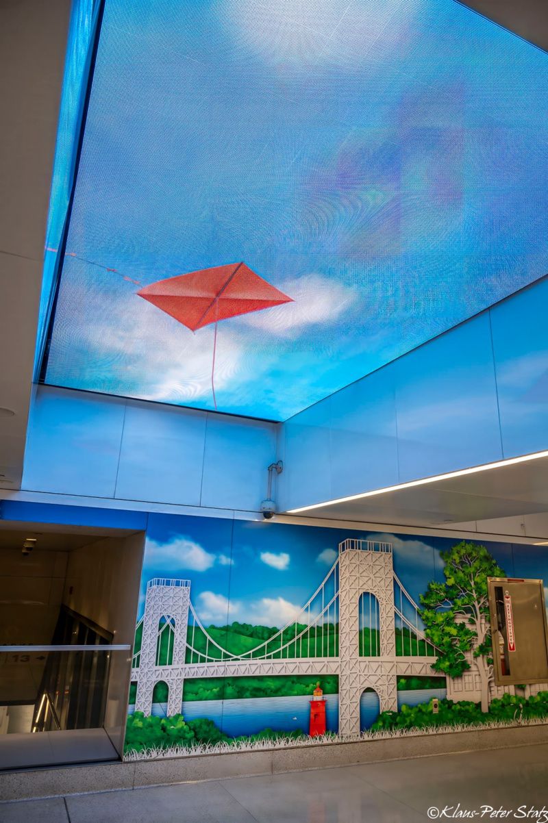 Kite on ceiling screen at LIRR Concourse