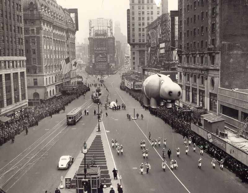 Thanksgiving DAy Parade balloons marched down the street