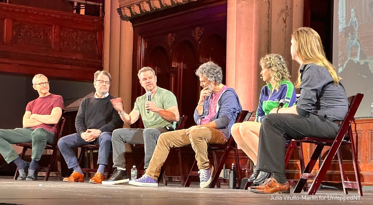 A panel of people on stage at West Park