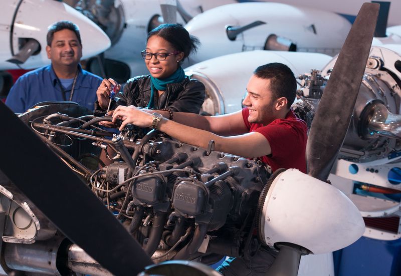 Students working on a plane at Vaughn College