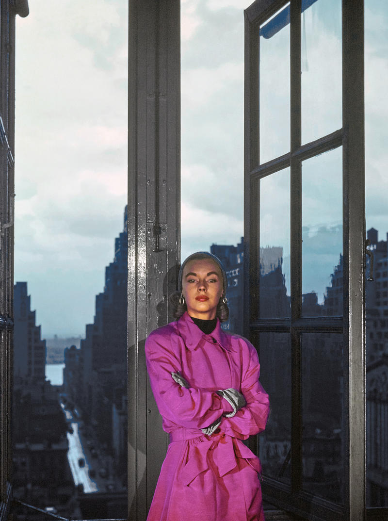 Woman in pink raincoat