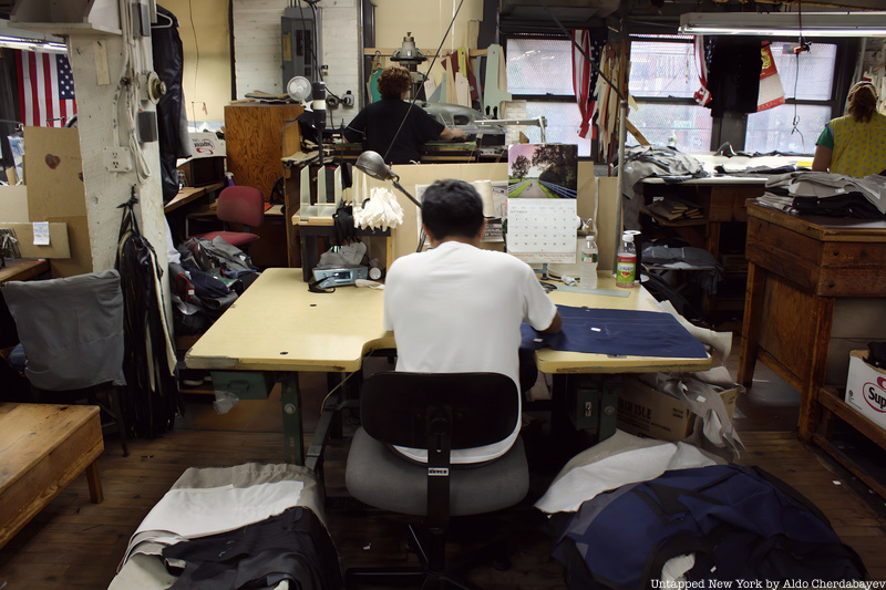 A person at a sewing machine