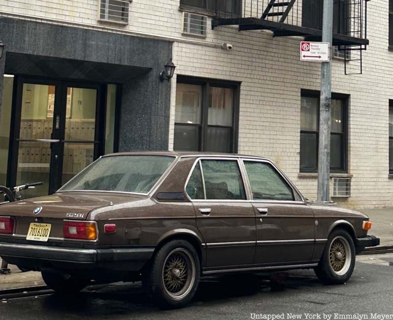 Vintage car parked in ASP zone.