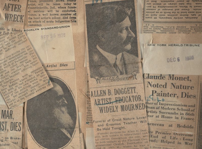 Newspaper obituary clippings in a scrapbook