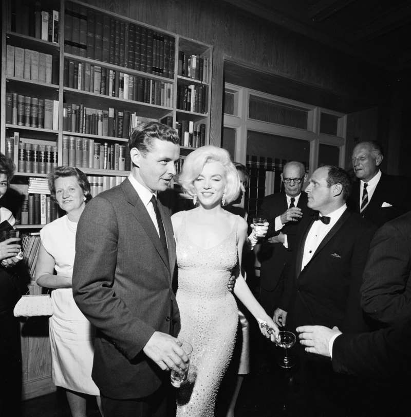 Stephen Smith and Marilyn Monroe at the Krims’ townhouse. Cecil Stoughton. White House Photographs. John F. Kennedy Presidential Library and Museum, Boston