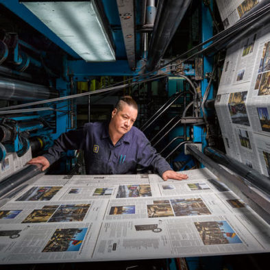 Worker inside the New York Times printing facility