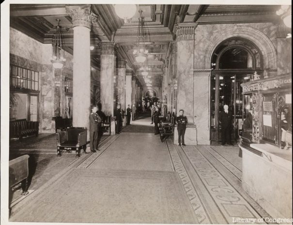 [Peacock Alley in the Waldorf-Astoria.]