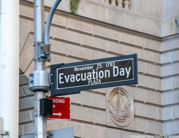 Evacuation day street sign