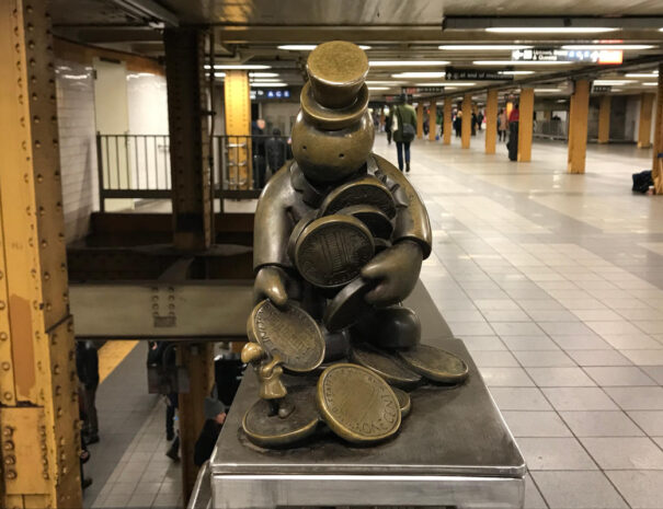 featured-14th-street-brass-subway-figures-nyc-untapped-cities1