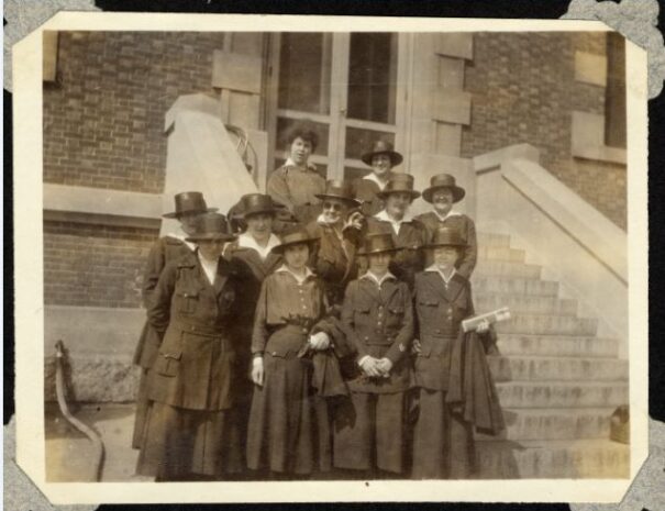 Group shot of nurses on the steps outside the hospital
