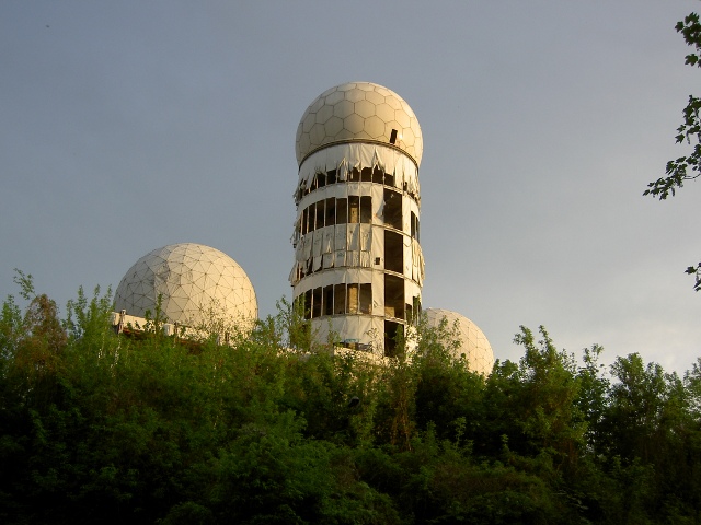 view from afar of the main tower flanked by two radomes