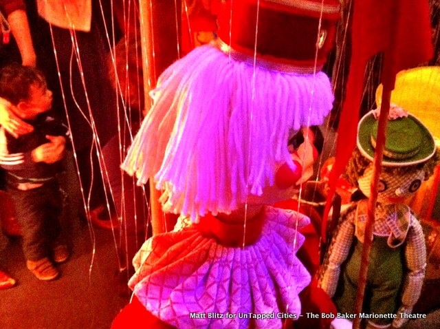 Untapped Cities - Red tinted Clown - At the Bob Baker Marionette Theater Los Angeles