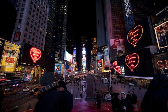 Tracey Emin's piece, "I Promise to Love You," lights up the billboards of Times Square. Photo by Ka-Man Tse.