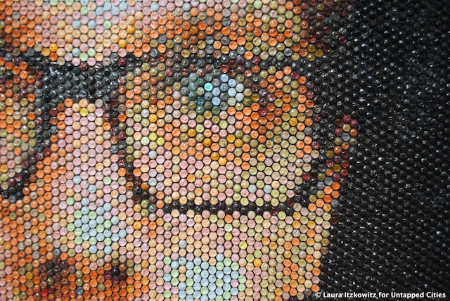 But upon closer inspection, you can see that the artist painted this large portrait on bubble wrap!