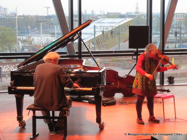 Two musicians improvise a performance at the Bimhuis