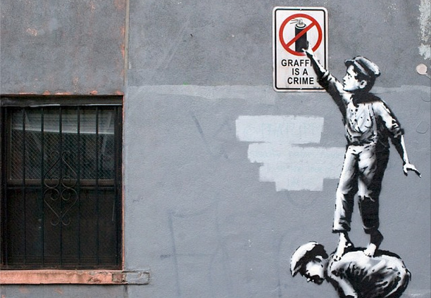 BanksyNYC-Banksy-Graffiti-is-a-Crime-Chinatown-NYC.png