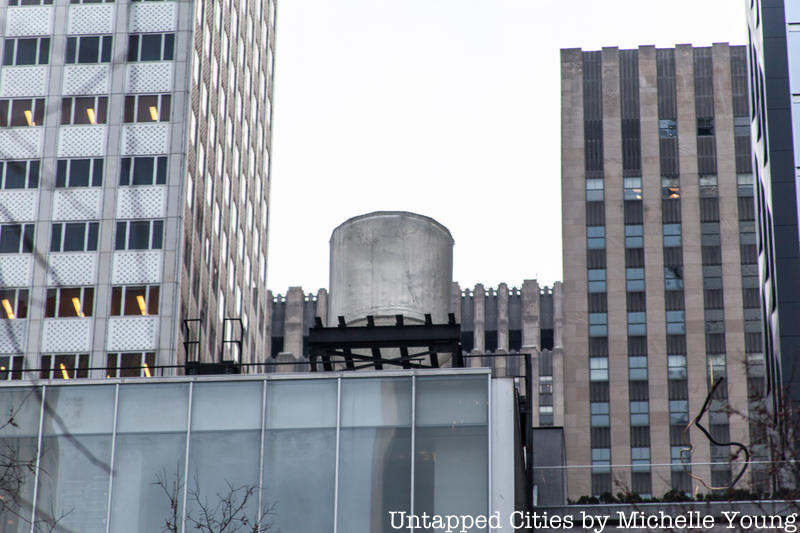 The Museum of Modern Art's rooftop sculpture visible in a Midtown scene. 