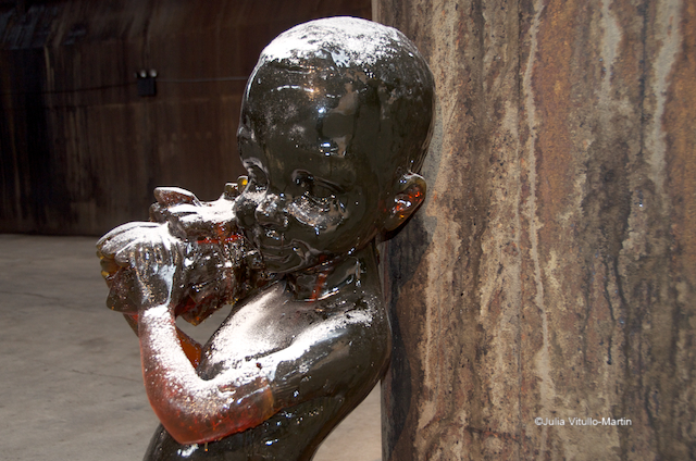 Slave boy sculpture made of amber candy