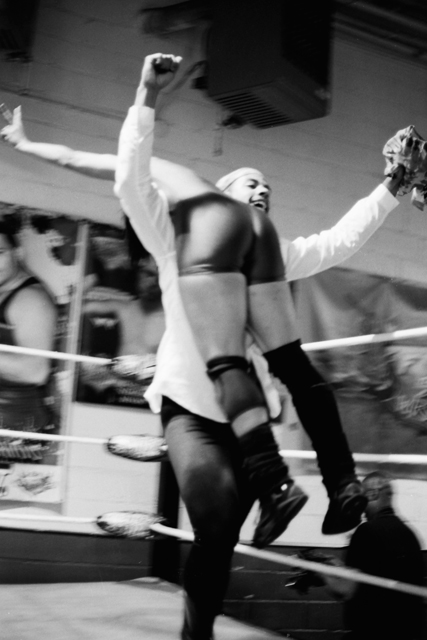 Manager Ejectivo Jorge Estrella and his wrestler La Rosa Negra celebrating a victory.