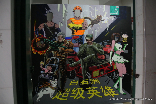 An installation illustrating the superheroes who sustain Shenzhen's urban villages.