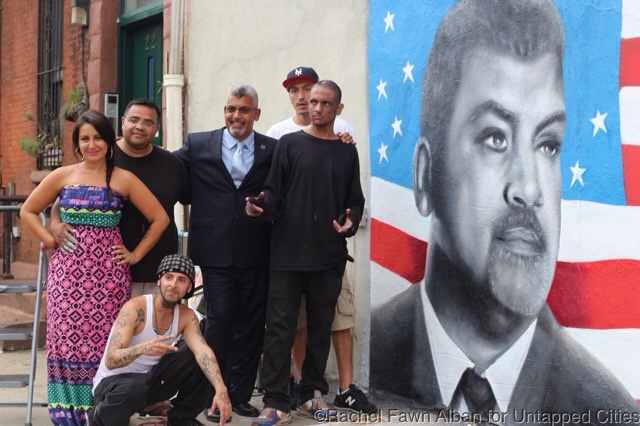 Artists pose with Joe Conzo, who was honored with this mural.