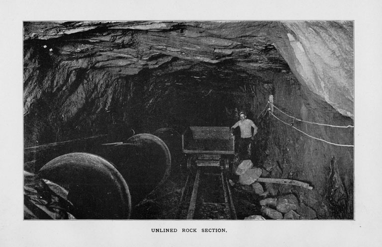 Photograph of the unlined rock section of the tunnel.