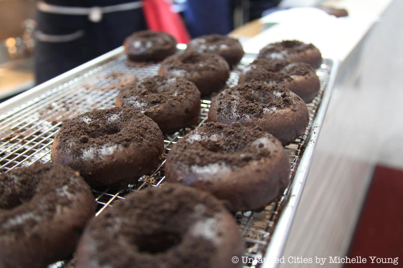 Chocolate donuts on a rack