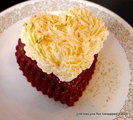 Red Velvet heart cake topped with made by Lady Lexis Sweets