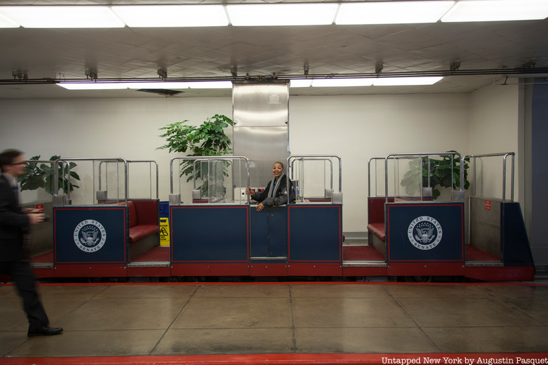 train conductor waving from U.S. Capitol subway 
