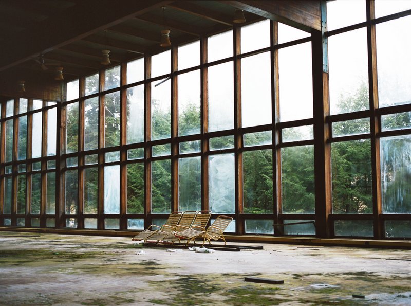 A large wall of broken windows at a Borsch Belt resort