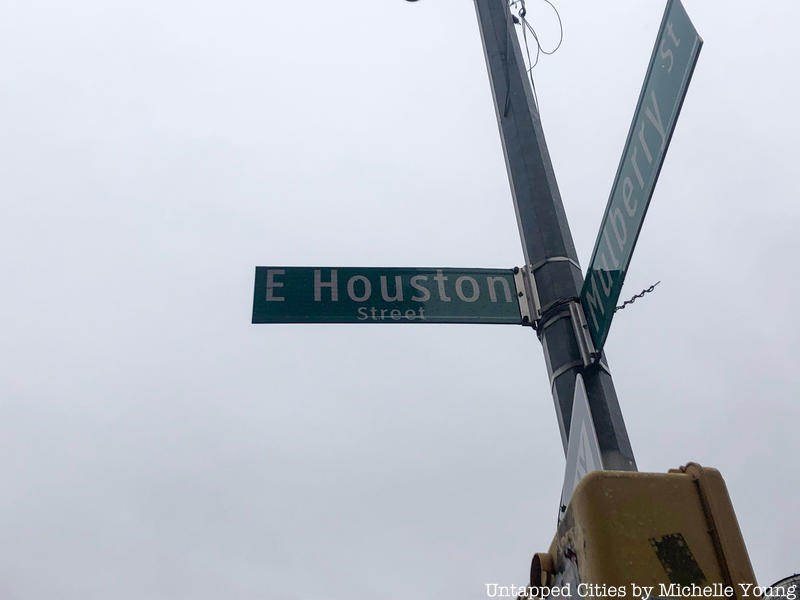 Houston Street sign where New York fashion designer Calvin Klein's billboard sits. 