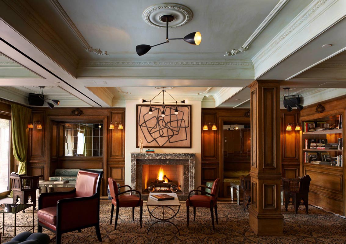 A fireplace makes this cozy coffee shop, The Marlton Hotel Espresso bar, even more inviting
