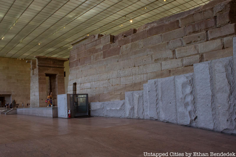 A side view of the Temple of Dendur where you can see the sloping granite platform meant to mimic the Egyptian hillside it once stood on.