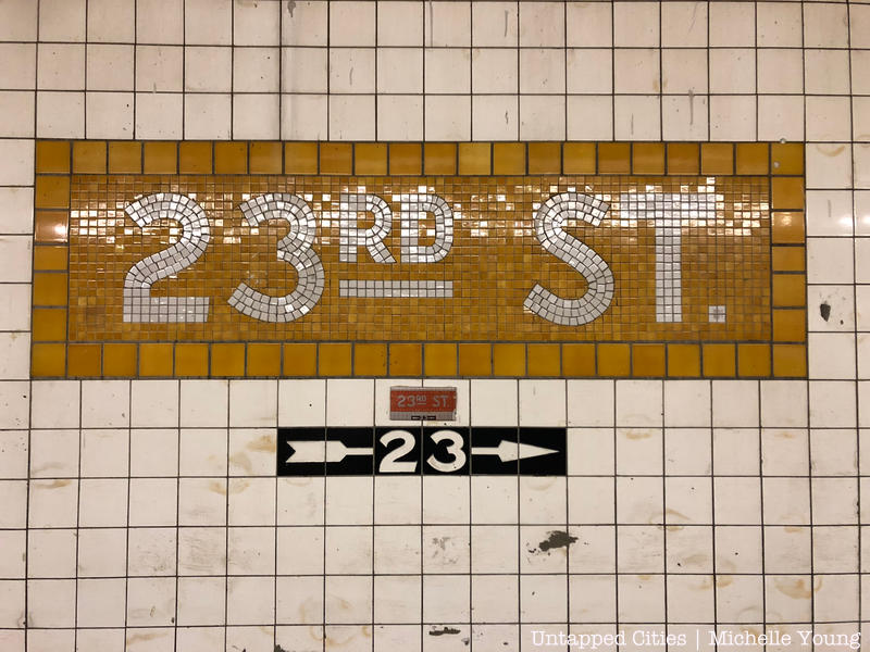 23rd Street yellow colored subway mosaic