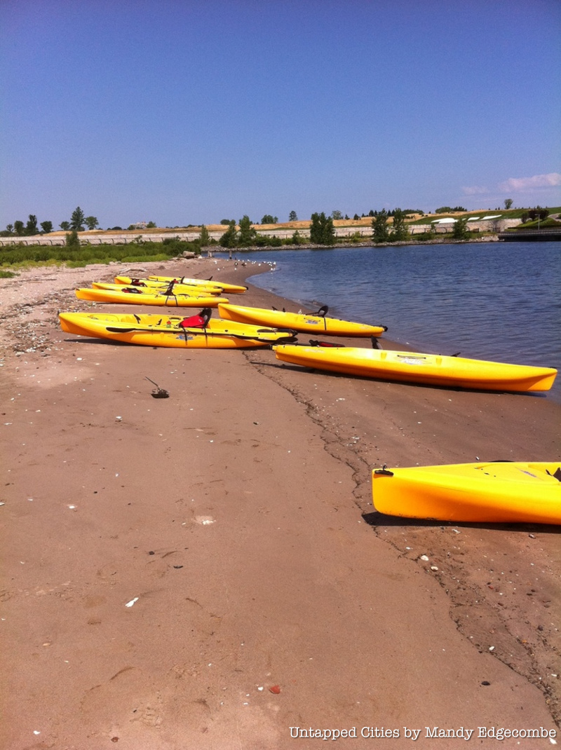 Yellow kayaks along the shore