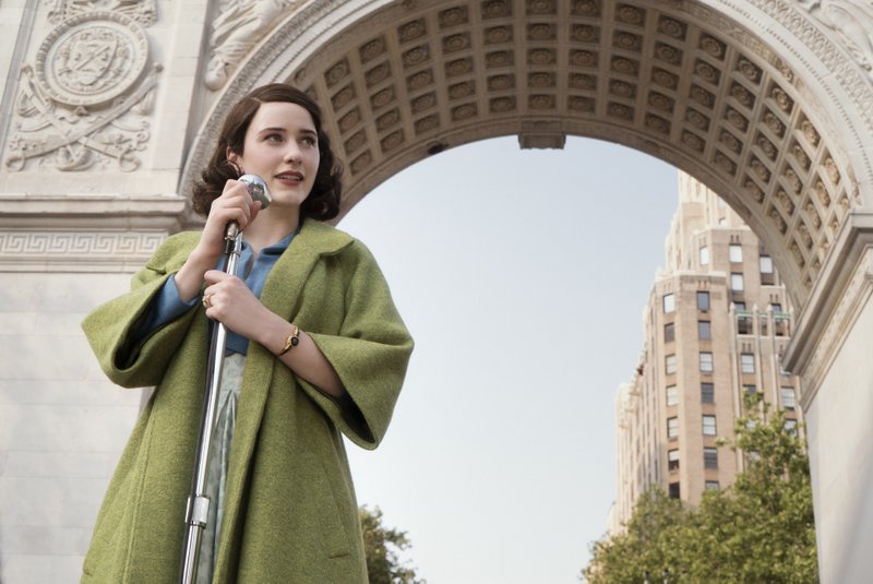 Midge in front of the arch at Washington Square Park in the Marvelous Mrs. Maisel
