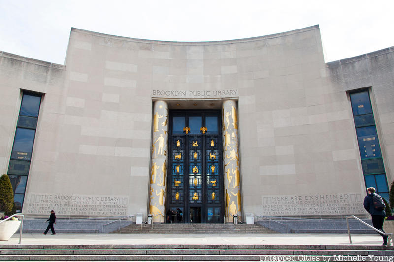 The Brooklyn Public Library's 50-foot entryway portico is the building’s most monumental feature, illuminating an otherwise spartan facade. 