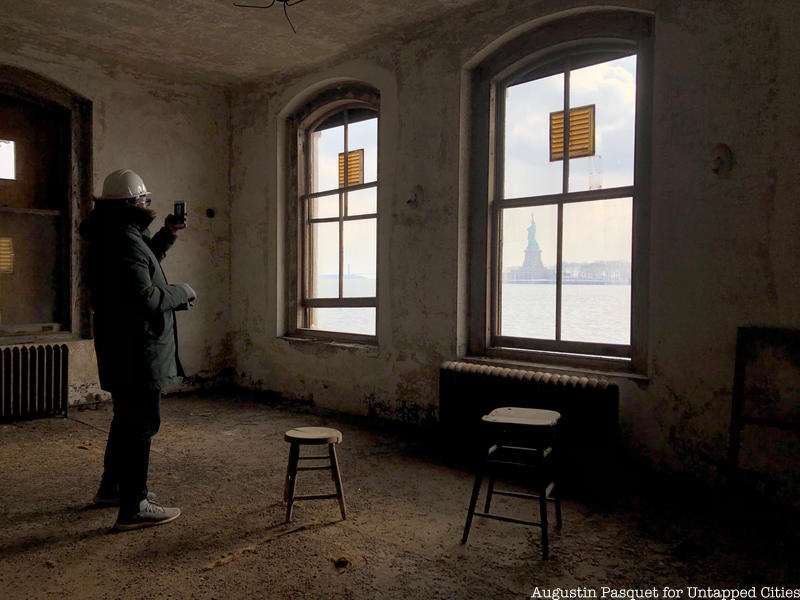 The view of the Statue of Liberty from Ellis Island’s abandoned hospital. 