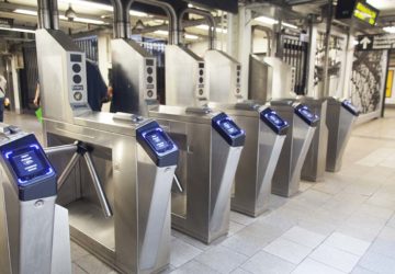 contactless payment system at subway turnstiles
