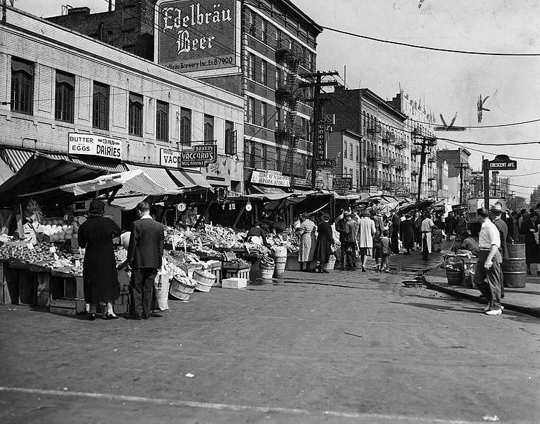 Black and white photo of pushcarts on Arthur Avenue