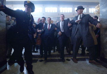 Robert De Niro, Al Pacino and crowd in The Irishman
