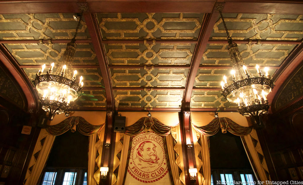 Coffered ceiling and logo of the Friars club