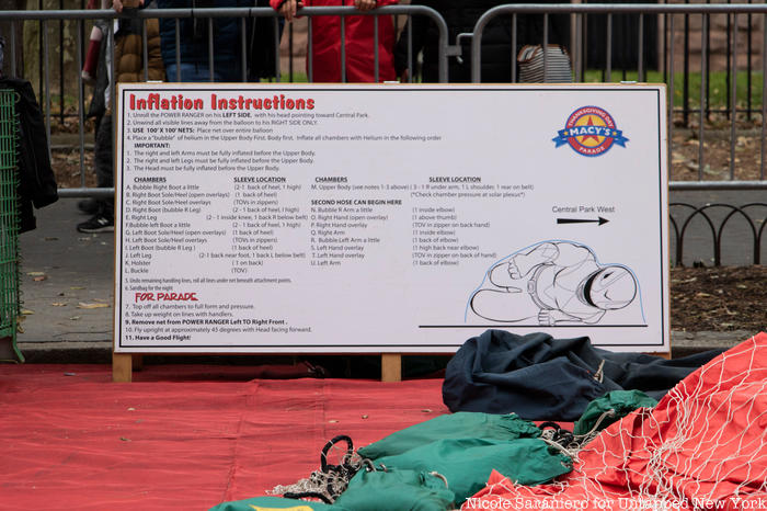 An instruction board for the Power Ranger balloon at the Macy's Thanksgiving Day Parade