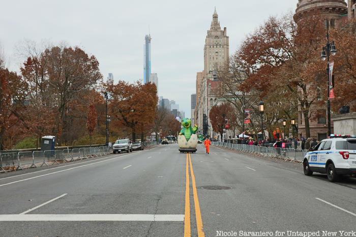 A dinosaur balloon on a test run of the Macy's Thanksgiving Day Parade route