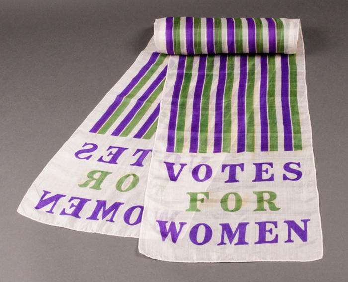 A scarf advocating for women's suffrage