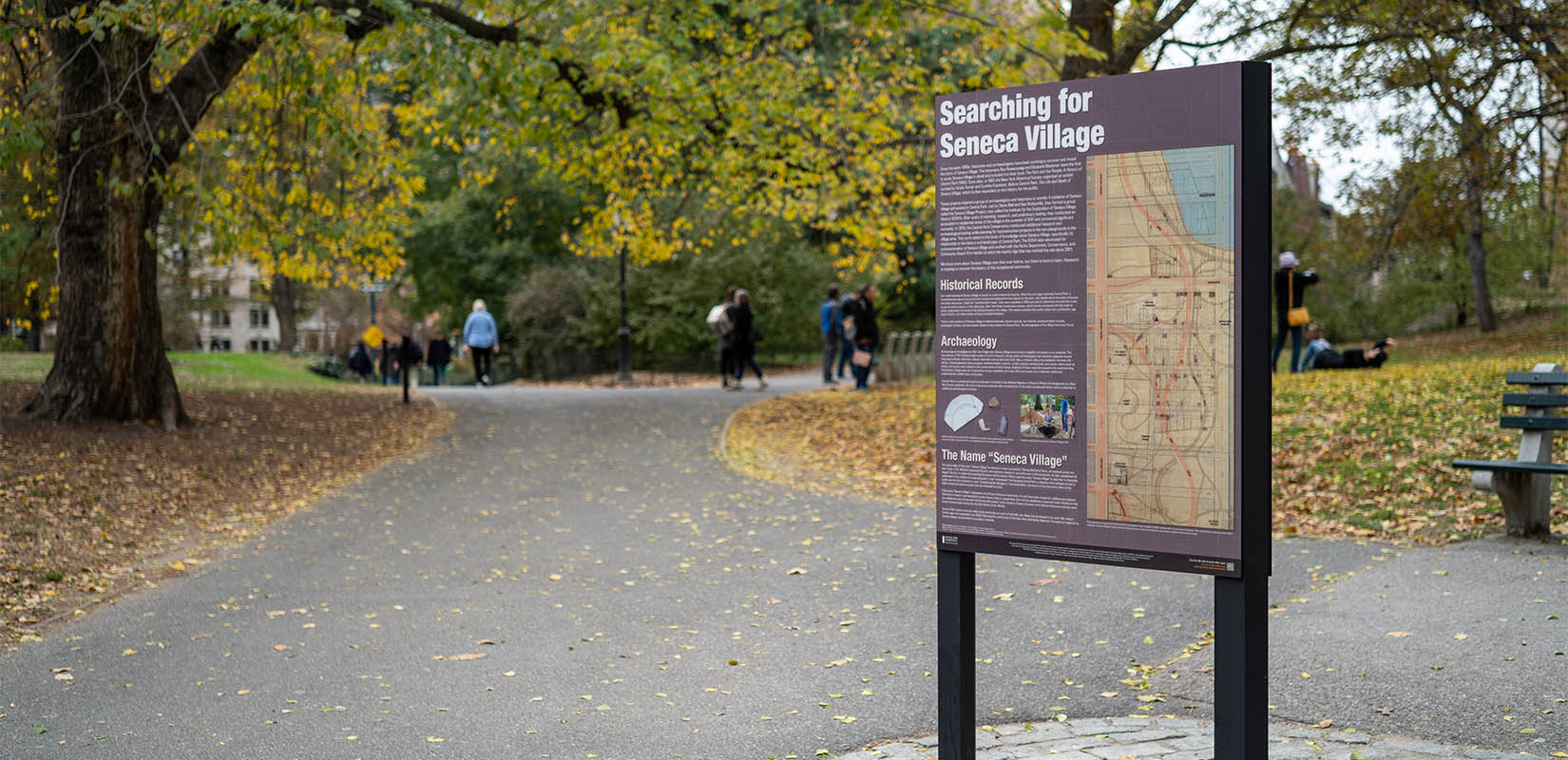 An interpretive sign at the Seneca Village site in Central Park that explores the area's Black history