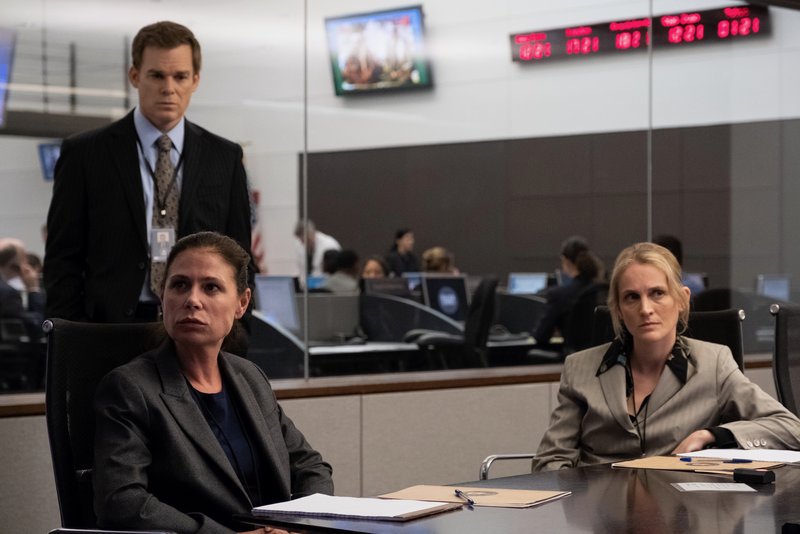 Michael C. Hall and Maura Tierney in The Report
