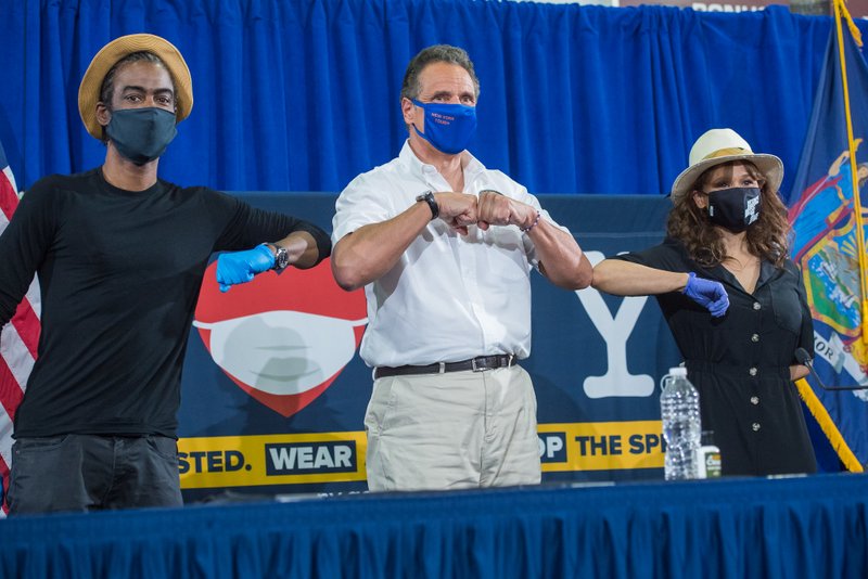 Chris Rock, Andrew Cuomo and Rosie Perez wearing masks