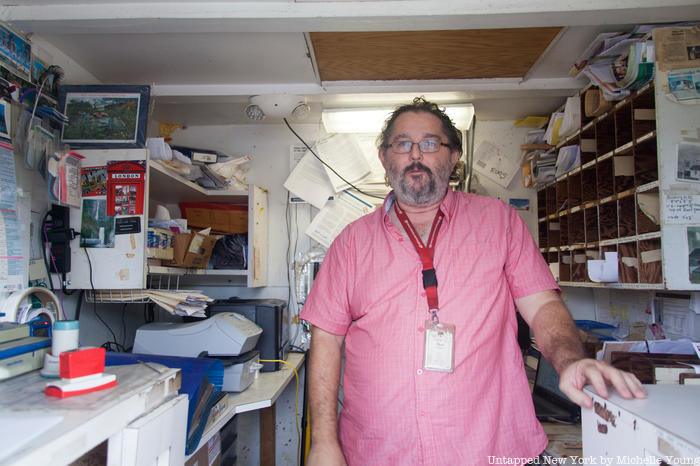 Donald Walters inside the Ochopee Post Office