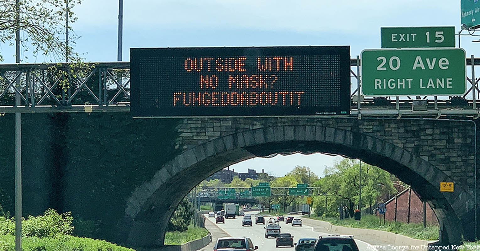 fuhgeddaboudit sign on 678 highway in the Bronx
